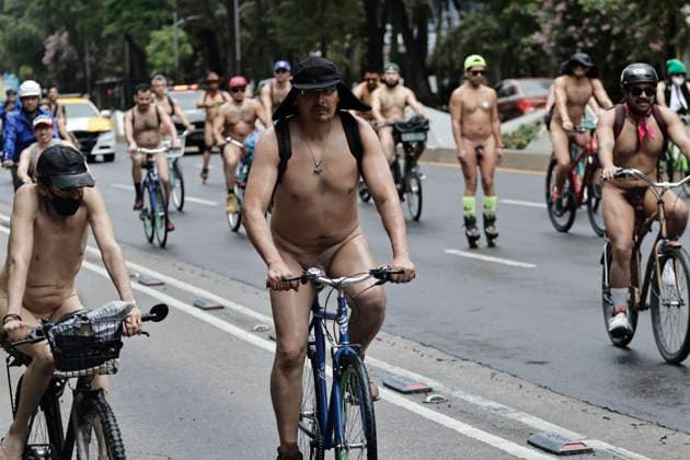 June 14, 2025, Mexico, Cdmx, Mexico: A group of cycling enthusiasts went out for a Nude Ride despite the rain in the city. They rode along Paseo de la Reforma Avenue, showing off their naked, rain-soaked bodies to passersby and tourists. Mexico Mexico - ZUMAp204 20250614_zip_p204_085 Copyright: xJosuexPerezx