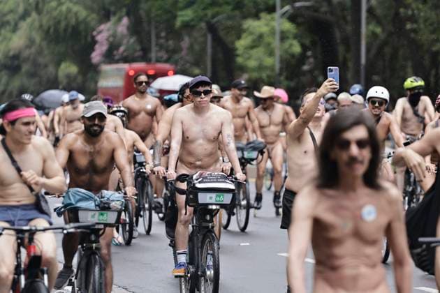 June 14, 2025, Mexico, Cdmx, Mexico: A group of cycling enthusiasts went out for a Nude Ride despite the rain in the city. They rode along Paseo de la Reforma Avenue, showing off their naked, rain-soaked bodies to passersby and tourists. Mexico Mexico - ZUMAp204 20250614_zip_p204_076 Copyright: xJosuexPerezx