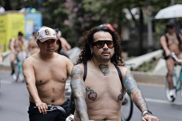 June 14, 2025, Mexico, Cdmx, Mexico: A group of cycling enthusiasts went out for a Nude Ride despite the rain in the city. They rode along Paseo de la Reforma Avenue, showing off their naked, rain-soaked bodies to passersby and tourists. Mexico Mexico - ZUMAp204 20250614_zip_p204_070 Copyright: xJosuexPerezx
