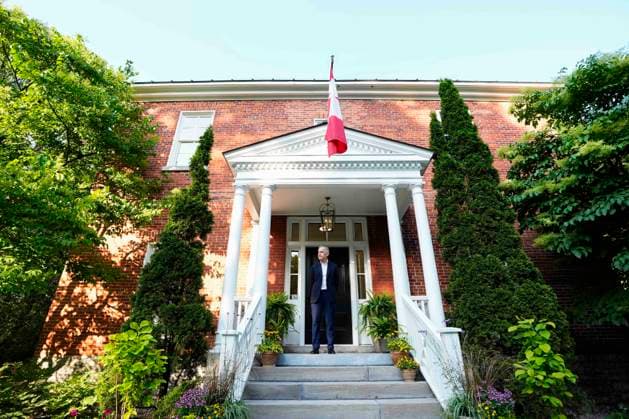 June 14, 2025, Ottawa, On, CANADA: Prime Minister Mark Carney waits to greet Prime Minister of the United Kingdom Keir Starmer, not shown, at his residence at Rideau Cottage in Ottawa, on Saturday, June 14, 2025. Ottawa CANADA  - ZUMAc35_ 20250614_zaf_c35_222 Copyright: xJustinxTangx