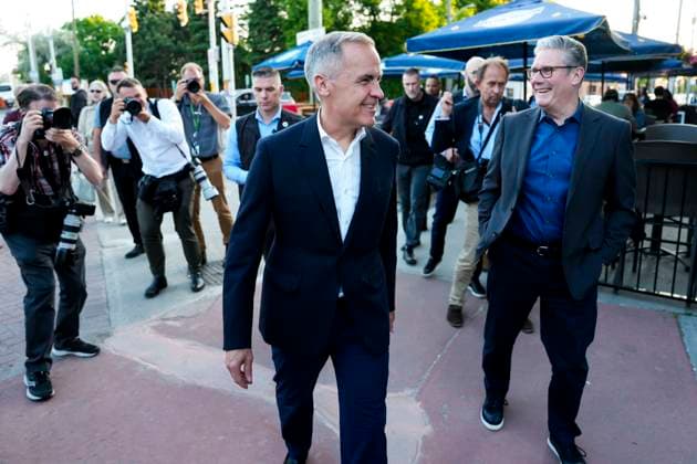 June 14, 2025, Ottawa, On, CAN: Prime Minister of Canada Mark Carney and Prime Minister of the United Kingdom Keir Starmer walk to a pub to watch the Edmonton Oilers play the Florida Panthers in the NHL s Stanley Cup Final, in Ottawa, on Saturday, June 14, 2025. Ottawa CAN  - ZUMAc35_ 20250614_zaf_c35_232 Copyright: xJustinxTangx