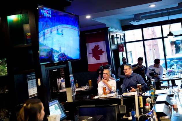 June 14, 2025, Ottawa, On, CAN: Prime Minister of Canada Mark Carney and Prime Minister of the United Kingdom Keir Starmer watch the Edmonton Oilers play the Florida Panthers in the NHL s Stanley Cup Final at a pub in Ottawa, on Saturday, June 14, 2025. Ottawa CAN  - ZUMAc35_ 20250614_zaf_c35_231 Copyright: xJustinxTangx