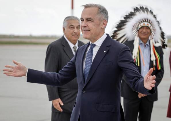 June 15, 2025, Calgary, Ab, CANADA: Canadian Prime Minister Mark Carney gestures as he arrives in Calgary, Alta., Sunday, June 15, 2025, to attend the G7 Leaders meeting taking place in the nearby community of Kananaskis. Calgary CANADA  - ZUMAc35_ 20250615_zaf_c35_201 Copyright: xJeffxMcintoshx