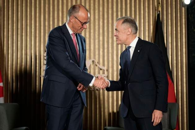 June 15, 2025, Kananaskis, Ab, Canada: Prime Minister Mark Carney meets with German Chancellor Friedrich Merz ahead of the G7 Summit at the Pomeroy Kananaskis Mountain Lodge, approximately 100km west of Calgary, in Kananaskis, Alta., Sunday, June 15, 2025. Kananaskis Canada - ZUMAc35_ 20250615_zaf_c35_223 Copyright: xAdrianxWyldx