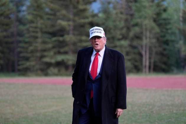 June 15, 2025, Kananaskis, Ab, Canada: U.S. President Donald Trump arrives at the G7 Summit in Kananaskis, Alta., Sunday, June 15, 2025. Kananaskis Canada  - ZUMAc35_ 20250615_zaf_c35_248 Copyright: xAdrianxWyldx