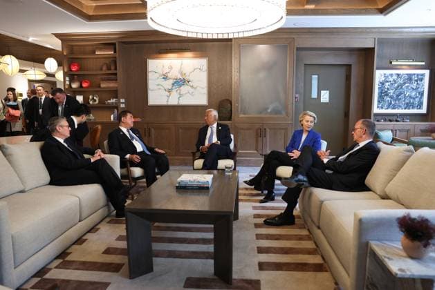 German Chancellor Friedrich Merz (L) speaks with European Commission President Ursula Von der Leyen (2-R), European Council President António Costa (C) and Japanese Prime Minister Shigeru Ishiba they meet during the Group of Seven (G7) Summit at the Pomeroy Kananaskis Mountain Lodge in Kananaskis, Alberta, Canada on Monday on June 16, 2025.  CAN2025061625 AlexandrosxMICHAILIDISx(EU)