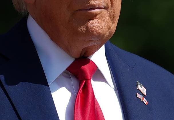 June 16, 2025, Kananaskis, Ab, CANADA: U.S. President Donald Trump wears U.S. and Canadian flag pins during the official welcoming at the G7 Summit in Kananaskis, Alta., on Monday, June 16, 2025. Kananaskis CANADA  - ZUMAc35_ 20250616_zaf_c35_179 Copyright: xDarrylxDyckx
