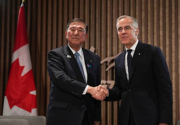 June 16, 2025, Kananaskis, Ab, CANADA: Japanese Prime Minister Shigeru Ishiba, left, and Canadian Prime Minister Mark Carney shake hands during a meeting at the G7 Summit in Kananaskis, Alta., on Monday, June 16, 2025. Kananaskis CANADA - ZUMAc35_ 20250616_zaf_c35_206 Copyright: xDarrylxDyckx