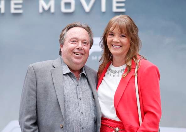 Richard L. Gelfond and Peggy Gelfond arrive on the red carpet for the Apple Original Films & Warner Bros. Pictures F1 World Premiere in Times Square on Monday, June 16, 2025 in New York City.  NYP20250616105 JOHNxANGELILLO