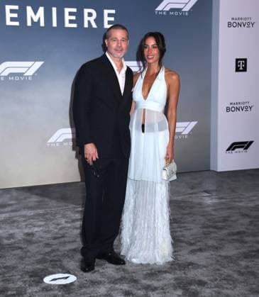 June 16, 2025, New York, Ny, United States: Brad Pitt and Ines de Ramon attend the World Premiere of Apple Original Films F1: The Movie at Times Square in New York. June 16, 2025. New York United States - ZUMAp281 20250616_zea_p281_026 Copyright: xPhotoxImagexPressx