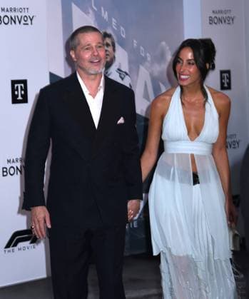 June 16, 2025, New York, Ny, United States: Brad Pitt and Ines de Ramon attend the World Premiere of Apple Original Films F1: The Movie at Times Square in New York. June 16, 2025. New York United States - ZUMAp281 20250616_zea_p281_029 Copyright: xPhotoxImagexPressx