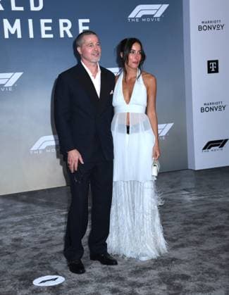 June 16, 2025, New York, Ny, United States: Brad Pitt and Ines de Ramon attend the World Premiere of Apple Original Films F1: The Movie at Times Square in New York. June 16, 2025. New York United States - ZUMAp281 20250616_zea_p281_037 Copyright: xPhotoxImagexPressx