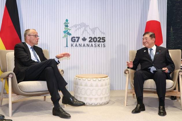 Japan-Germany talks Japanese Prime Minister Shigeru Ishiba (R) and German Chancellor Friedrich Merz hold talks on June 16, 2025, in Kananaskis, Canada, on the fringes of the Group of Seven summit. (Pool photo)  A14AA0004663319P