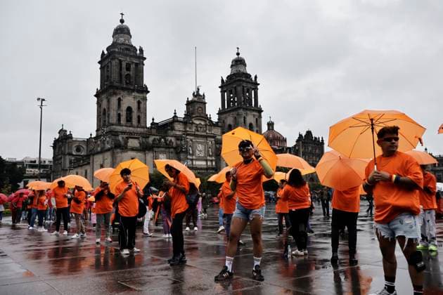 June 22, 2025, Mexico, Cdmx, Mexico: Hundreds of people gathered in Mexico City s Plaza de la ConstitucioÂ³n to break the record for the world s largest LGBTTTIQA+ flag. For this event, they used umbrellas in the same colors as the gay community flag. Mexico Mexico - ZUMAp204 20250622_zip_p204_018 Copyright: xJosuexPerezx