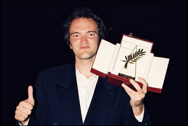 ARCHIVES - QUENTIN TARANTINO PALME D OR POUR PULP FICTION AU FESTIVAL DE CANNES EN 1994 Cannes France *** Archiv QUENTIN TARANTINO PALME D Gold für PULP Fiktion Au FESTIVAL von Cannes IN 1994 Cannes Frankreich  Copyright: xANGELI-RINDOFF-GARCIAx xBESTIMAGExANGELI-RINDOFF-GARCIAx xBESTIMAGEx