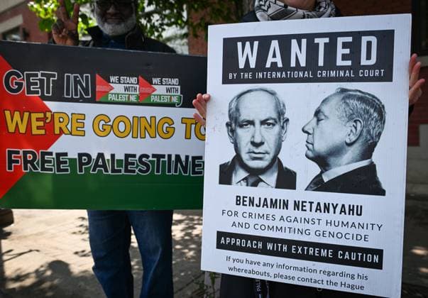 Woman With Israeli Flag Attacked During Edmonton Pro-Palestine Protest EDMONTON, CANADA JUNE 22: A protester holds a placard titled WANTED featuring an image of Israeli Prime Minister Benjamin Netanyahu as members of the local Palestinian diaspora, joined by Iranian and other Middle Eastern Muslim protesters and local activists, gather on White Avenue in Edmonton for the Hands Off Palestine, Iran, Syria, Yemen, Lebanon protest on June 22, 2025, in Edmonton, Alberta, Canada. Edmonton Canada Copyright: xArturxWidakx originalFilename: widak-womanwit250622_np4Gx.jpg