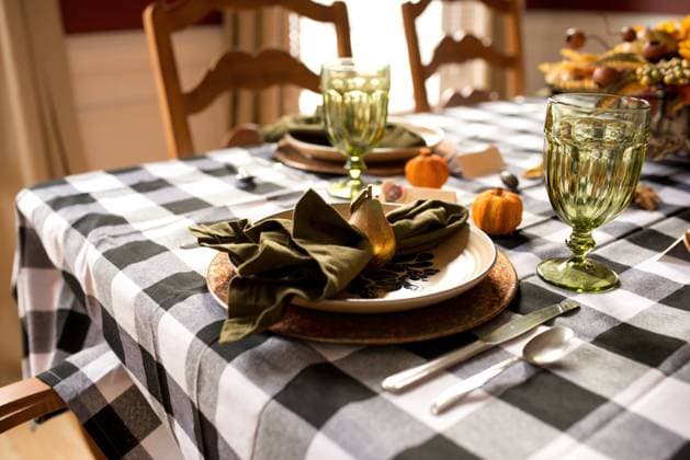 Thanksgiving table setting decorated with pumpkins and golden pear Portage, Michigan, United States R_TBFG250620A-1772192-01