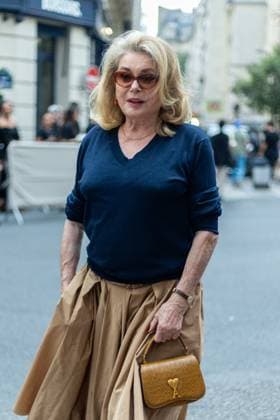 PFW AMI Men s Spring 2026 - Arrivals NB Catherine Deneuve attends the AMI show as part of Paris Men s Spring 2026 Fashion Week on June 25, 2025 in Paris, France. Photo by Nasser Berzane ABACAPRESS.COM Paris France  Copyright: xBerzanexNasser ABACAx