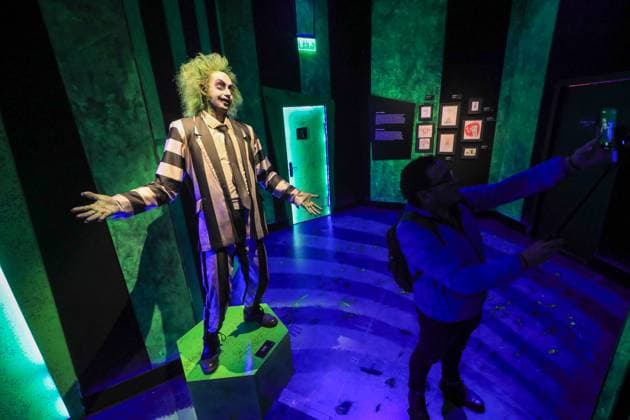 June 25, 2025, Mexico City, Ciudad de Mexico, Mexico: A person looks Fictional characters created by American director, producer, screenwriter, cartoonist, and writer Tim Burton while taking a tour during the immersive exhibition Tim Burton s Labyrinth at Lienzo Charro. on June 25, 2025 in Mexico City, Mexico. Mexico City Mexico - ZUMAe321 20250625_zea_e321_017 Copyright: xIanxRoblesx
