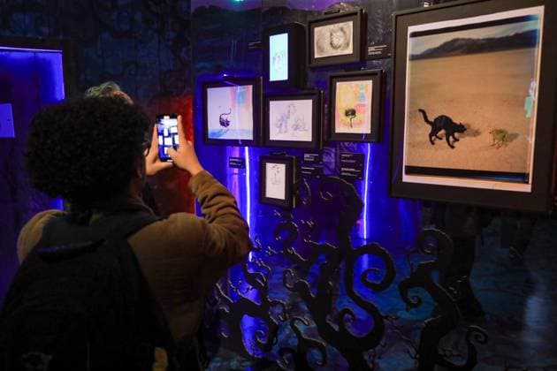 June 25, 2025, Mexico City, Ciudad de Mexico, Mexico: A person looks Fictional characters created by American director, producer, screenwriter, cartoonist, and writer Tim Burton while taking a tour during the immersive exhibition Tim Burton s Labyrinth at Lienzo Charro. on June 25, 2025 in Mexico City, Mexico. Mexico City Mexico - ZUMAe321 20250625_zea_e321_029 Copyright: xIanxRoblesx