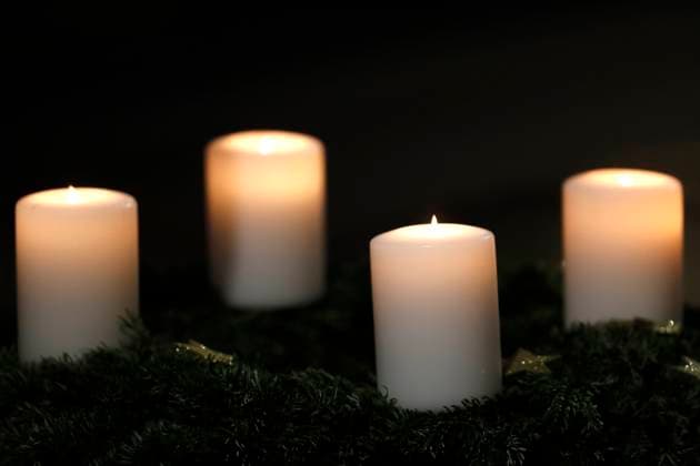 St Joseph church. Christmas mass celebration in a parish. Advent wreath with candles. Geneva. Switzerland. Geneva Switzerland
