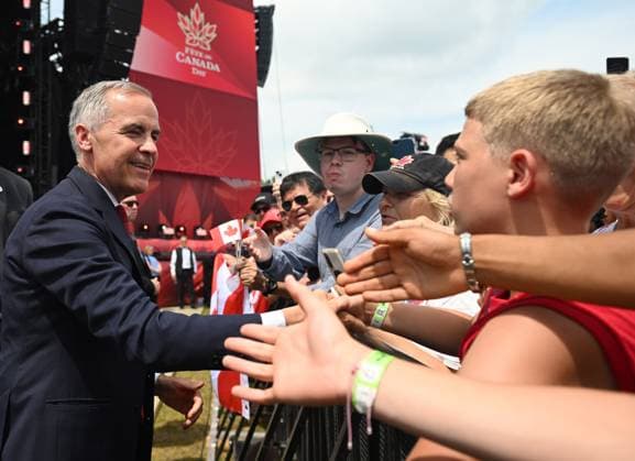 July 1, 2025, Ottawa, On, Canada: Prime Minister Mark Carney greets members of the public during Canada Day celebrations at LeBreton Flats in Ottawa on Tuesday, July 1, 2025. Ottawa Canada  - ZUMAc35_ 20250701_zaf_c35_018 Copyright: xSpencerxColbyx