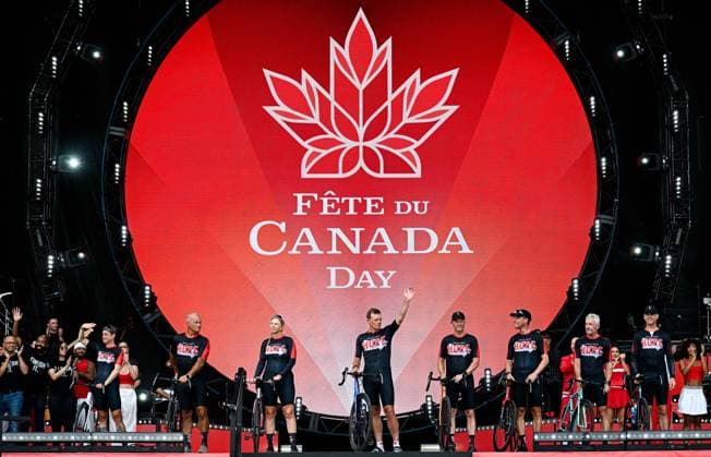 July 1, 2025, Ottawa, On, Canada: Darrell Fox (centre), brother to the late-Terry Fox, waves to the crowd after being honoured on stage during Canada Day celebrations at LeBreton Flats in Ottawa, on Tuesday, July 1, 2025. Ottawa Canada  - ZUMAc35_ 20250701_zaf_c35_088 Copyright: xSpencerxColbyx