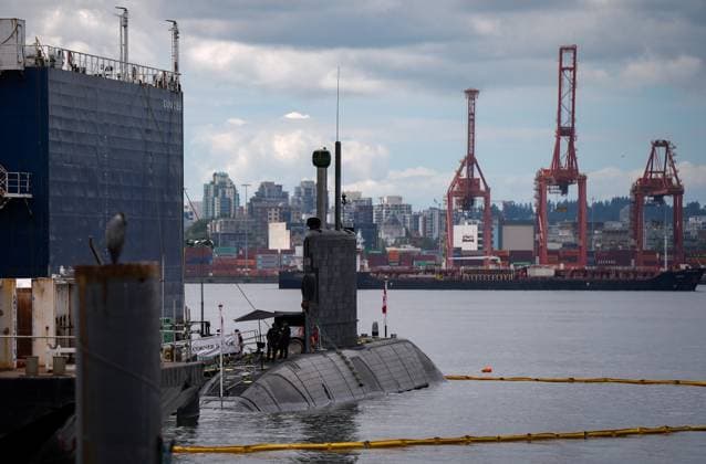 July 3, 2025, North Vancouver, Bc, CANADA: Members of the Royal Canadian Navy stand aboard the HMCS Corner Brook submarine docked during Fleet Week, in North Vancouver, B.C., on Thursday, July 3, 2025. North Vancouver CANADA  - ZUMAc35_ 20250703_zaf_c35_058 Copyright: xDarrylxDyckx