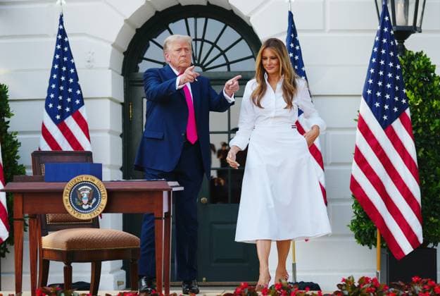President Donald Trump and First Lady Melania Trump arrive for a bill signing ceremony during a Fourth of July celebration on the South Lawn of the White House in Washington, Friday, July 4, 2025.  WAP20250704418 BONNIExCASH