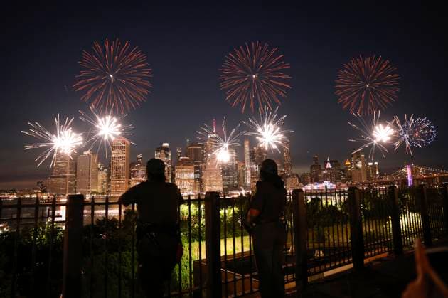 Spectators watch as fireworks explode over the Brooklyn Bridge and the Manhattan skyline during the annual Macy s 4th of July Fireworks Spectacular for Independence Day on Friday, July 4, 2025, in New York City.  NYP20250704204 JOHNxANGELILLO