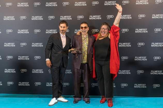 Clemens Schick , Soujiro Sanada und Anna Hints bei der Preisverleihung auf dem 42. Filmfest München 2025 im Amerikahaus. München, 05.07.2025