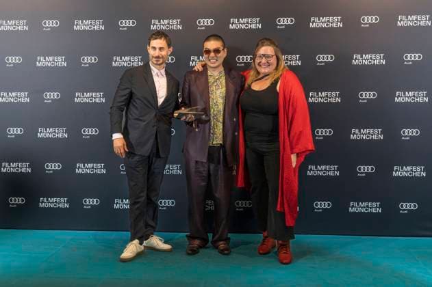 Clemens Schick , Soujiro Sanada und Anna Hints bei der Preisverleihung auf dem 42. Filmfest München 2025 im Amerikahaus. München, 05.07.2025