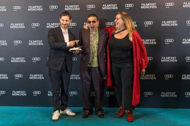 Clemens Schick , Soujiro Sanada und Anna Hints bei der Preisverleihung auf dem 42. Filmfest München 2025 im Amerikahaus. München, 05.07.2025