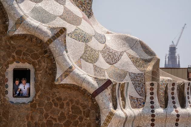 Overtourism At Park Guell In Barcelona. Tourists stroll through Park Guell and take pictures with Antoni Gaudi s architecture and the famous Park Guell Lizard during a hot morning in Barcelona, Spain, on July 6, 2025. The Catalan capital receives 20.37 million tourists annually, equivalent to a density of 201,722 visitors per square kilometer, making Barcelona the most crowded and tourist-filled city in the world. Barcelona Spain  Copyright: xMarcxAsensiox originalFilename: asensioclupes-overtour250706_npOsR.jpg