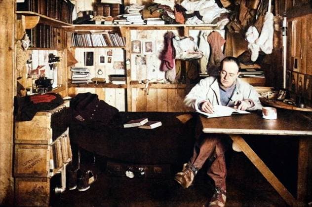 RECORD DATE NOT STATED Captain Scott Writing Up His Journal, c1911, (1928). British explorer Captain Robert Falcon Scott (1868-1912) writing in his quarters at Cape Evans in Antarctica. Scott, accompanied by Dr Edward Wilson, Captain Lawrence Oates, Lieutenant Henry Bowers and Petty Officer Edgar Evans, reached the South Pole on 17 January 1912, only to find that the Norwegian expedition under Amundsen had beaten them to their objective by a month. Delayed by blizzards, and running out of supplies, Scott and the remainder of his team died at the end of March. Their bodies and diaries were found eight months later. From The Book of Polar Exploration, by E. L. Elias. George G. Harrap & Company Ltd., London, 1928 . (Colorised black and white print). Copyright:xThex  Copyright:ThexPrintxCollector HeritagexImagesxHerbertxPontingx IMAGO