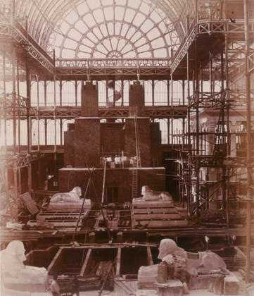 RECORD DATE NOT STATED Preparations for the erection of the Colossi of Aboo Simbel, Crystal Palace, Sydenham, 1852-1854. Designed by Sir Joseph Paxton to house the Great Exhibition of 1851 in Hyde Park, the Crystal Palace was reconstructed and enlarged in Sydenham in 1852. The first column was raised on 5 August 1852 and the palace was opened by Queen Victoria on 10 June 1854. Many exhibitions and events were subsequently held at the Crystal Palace until it burnt down on 30 November 1936. The park contained a motor racing circuit from 1937 until 1972 and the famous athletics track dates back to the foundation of the Crystal Palace Athletics Club in 1868. Plate 39 from Photographic Views of the Progress of the Crystal Palace, Sydenham. Taken during the progress of  Copyright:HeritagexArt HeritagexImagesxPhilipxHenryxDelamottex IMAGO