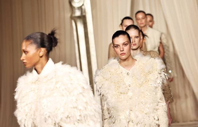 (250708) -- PARIS, July 8, 2025 -- Models present creations from the haute couture Fall-Winter 2025 2026 collections by French fashion house Chanel during the Paris Haute Couture Week, in Paris, France, on July 8, 2025. ) FRANCE-PARIS-HAUTE COUTURE WEEK-CHANEL GaoxJing 
