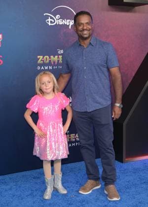Zombies 4 Dawn of the Vampires Premiere - Los Angeles, USA LOS ANGELES, USA. July 08, 2025: Alfonso Ribeiro & Guest at the premiere for Disney s Zombies 4: Dawn of the Vampires . Los Angeles CA USA  Copyright: xPaulxSmith Featureflashx