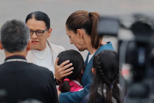 MexicoÃ¢â‚¬â ¢s President Claudia Sheinbaum Pardo, hugs a girl during the ceremony of the International Day for the Destruction of Firearms, 2,090 weapons were seized and destroyed at Basilica of Guadalupe. on July 9, 2025 in Mexico City, Mexico. Mexico City Mexico - ZUMAe321 20250709_zia_e321_050 Copyright: xCarlosxSantiagox