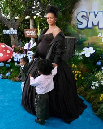 Rihanna, the voice of Smurfette in the animated musical comedy Smurfs and her sons Riot Rose Mayers (L) and RZA Athelston Mayers attend the premiere of the motion picture at Paramount Studios in Los Angeles on Sunday, July 13, 2025. Storyline: When Papa Smurf (John Goodman) is mysteriously taken by evil wizards, Razamel and Gargamel, Smurfette (Rihanna) leads the Smurfs on a mission into the real world to save him. With the help of new friends, the Smurfs must discover what defines their destiny to save the universe.  LAP2025071312 JIMxRUYMEN