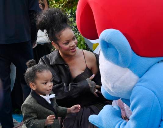 Rihanna, the voice of Smurfette in the animated musical comedy Smurfs and her son Riot Rose Mayers attend the premiere of the motion picture at Paramount Studios in Los Angeles on Sunday, July 13, 2025. Storyline: When Papa Smurf (John Goodman) is mysteriously taken by evil wizards, Razamel and Gargamel, Smurfette (Rihanna) leads the Smurfs on a mission into the real world to save him. With the help of new friends, the Smurfs must discover what defines their destiny to save the universe.  LAP2025071316 JIMxRUYMEN
