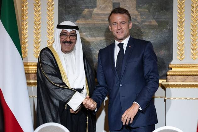 Signing of a bilateral agreement with Kuwait at the Elysee - Paris French President Emmanuel Macron shakes hands with Emir of Kuwait Sheikh Meshal Al Ahmad Al Sabah during the signing of a bilateral agreement with Kuwait at the presidential Elysee Palace in Paris on July 14, 2025. Photo by Raphael Lafargue ABACAPRESS.COM Paris France  Copyright: xLafarguexRaphael ABACAx