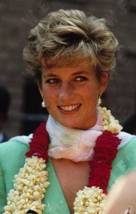 Diana Princess of Wales wears a garland during her visit to Lahore Lahore, Pakistan - October 1991, United Kingdom Anwar Hussein WENN 927664.jpg