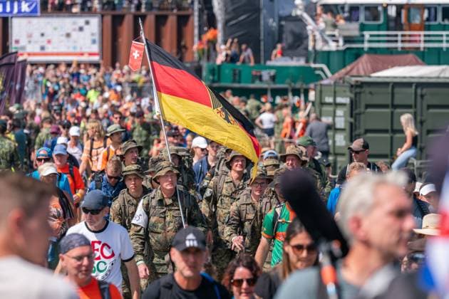 2025-07-18 Day 4 Four Days Marches Nijmegen CUIJK, NETHERLANDS - JULY 18: Day 4 of the Four Day Marches (Vierdaagse 4daagse), the world s biggest multi-day walking event with about 47.000 participants. Photo depicts a group of german soldiers walking over a pontoon bridge, a floating bridge installed by the military.. On July 18, 2025 in Cuijk, Netherlands. Cuijk Netherlands Content not available for redistribution in The Netherlands directly or indirectly through any third parties. Copyright: xJohnxBeckmannx
