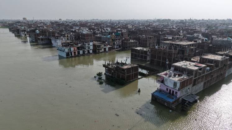 July 19, 2025, Prayagraj, Uttar Pradesh, India: Prayagraj: A view of houses submerged with water of Swollen River Ganga at Chhota Baghara Area, in Prayagraj on Saturday, July 19, 2025. Prayagraj India - ZUMAv115 20250719_zap_v115_011 Copyright: xPrabhatxKumarxVermax
