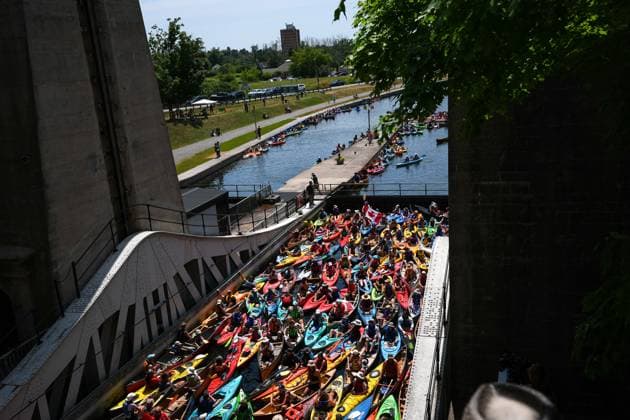 Lock & Paddle 2025 in Canada PETERBOROUGH, CANADA - JULY 19 : Hundreds of paddlers attend the Lock & Paddle 2025 event at historic Peterborough Lift Lock within ‘Canada’s Parks Day’ in Peterborough, Ontario, Canada on July 19, 2025. Participants are lifted up and down the historic lock, located on the Trent Canal at Trent-Severn Waterway National Historic Site, as part of the Canada’s Parks Day event, celebrated on the third Saturday of July each year. Mert Alper Dervis Anadolu Ontario Canada. Editorial use only. Please get in touch for any other usage.  Copyright: x2025xAnadoluxMertxAlperxDervisx