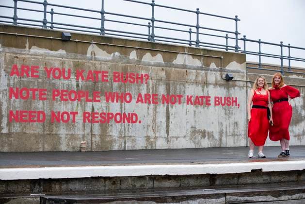The most Wuthering Heights Day in Folkestone, UK - 20 Jul 2025 Fans stand by the Kate Bush street art on the Folkestone Pier. Hundreds of Kate Bush fans gathered in red dresses on the Folkestone Pier to celebrate the Most Wuthering Heights Day or Kate Bush Day with dance. Folkestone United Kingdom Copyright: xKrisztianxElekx xSOPAxImagesx SSS_20250720_KATE_BUSH_0011013