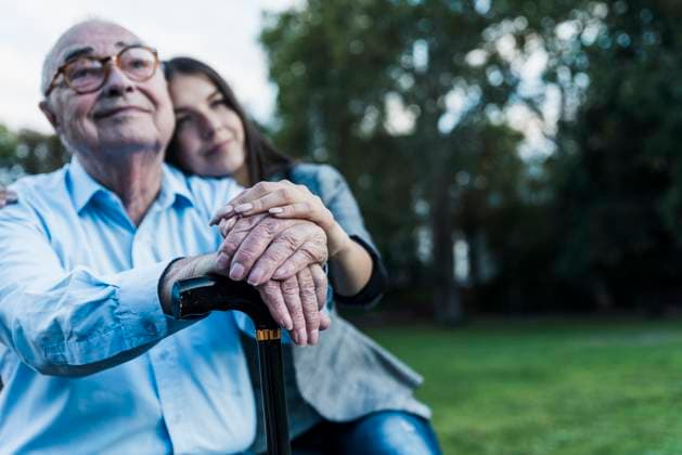 Creative Highlight Symbolbilder Senior with family member outdoors showing care and happiness model released, Symbolfoto, UUF35042