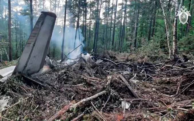 RUSSIA, AMUR REGION - JULY 24, 2025: Wreckage of an Antonov An-24RV passenger plane operated by Angara Airlines that crashed near the town of Tynda. The plane flying from Khabarovsk through Blagoveshchensk to Tynda was carrying, according to different sources, about 50 passengers, including 6 crew members, no survivors have been found yet. Video grab. Best quality available Russia  - ZUMAt113 20250724_zaa_t113_190 Copyright: xInvestigativexCommitteex