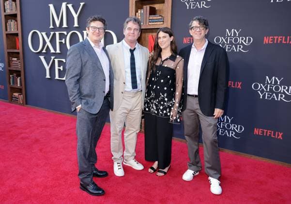 LOS ANGELES, CA - JULY 24: Isaac Klausner, Marty Bowen, Laura Quicksilver and Wyck Godfrey at the NETFLIX Los Angeles premiere of My Oxford Year on July 24, 2025 at the Tudum Theater in Los Angeles, California. Copyright: xMediaPunchx